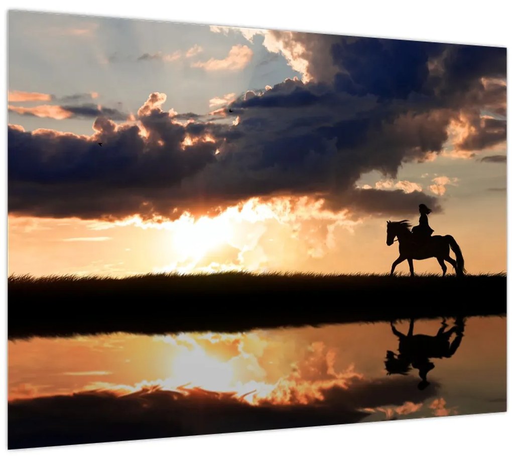 Sklenený obraz - Jazdec na koni pri západe slnka (70x50 cm)