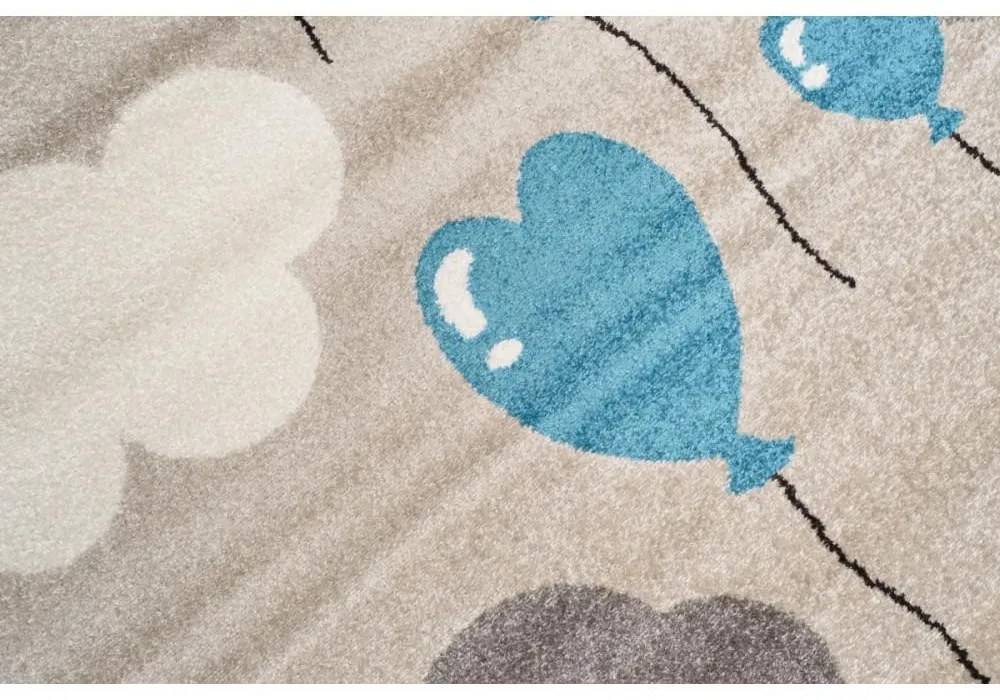 Detský kusový koberec Modré balóniky béžový 133x190cm
