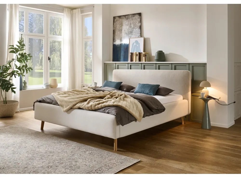 Krémová čalúnená dvojlôžková posteľ s úložným priestorom s roštom 180x200 cm Mattis – Meise Möbel