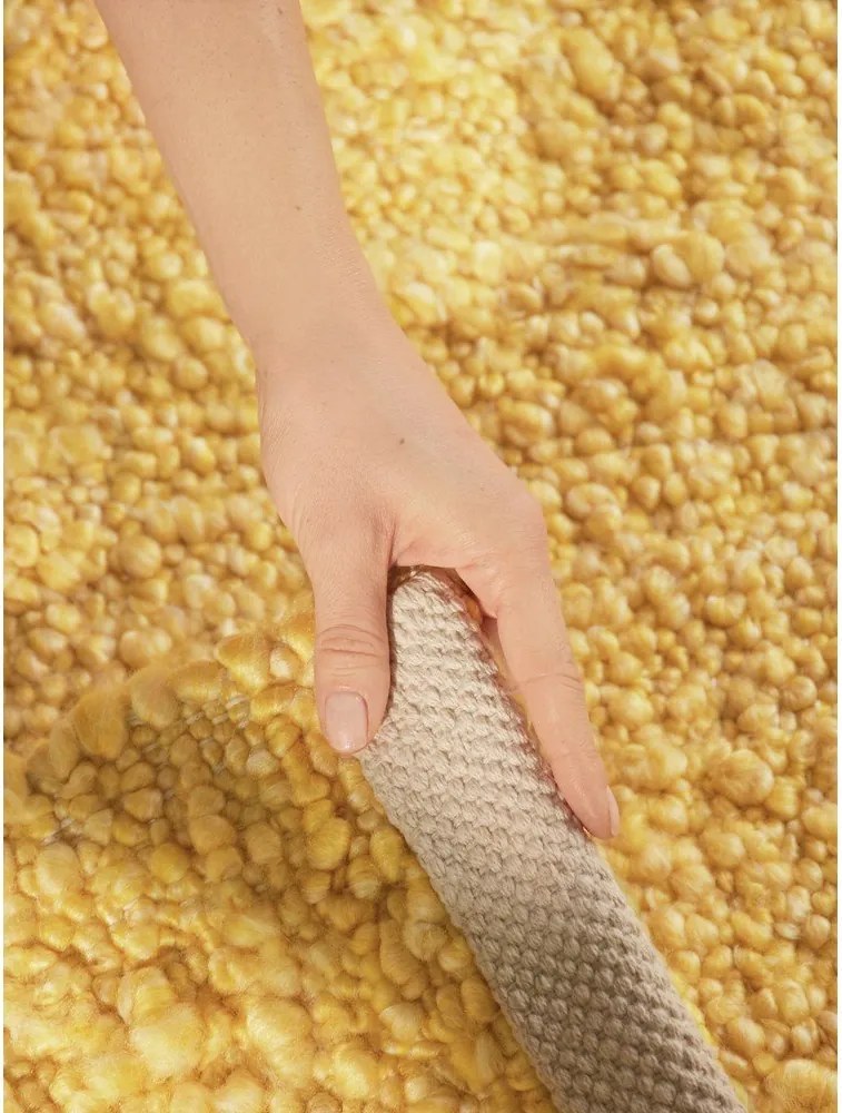 Žltý ručne tkaný koberec z materiálu buklé 160x230 cm Notting Hill Portobello – Ted Baker