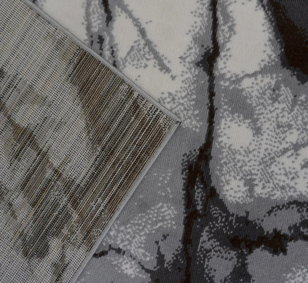 Koberec Lotus 9302 GREY – sivý s abstraktným vzorom Rozmer: 50x80 cm