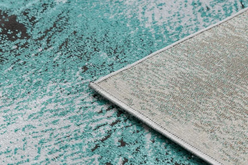 Moderný koberec DE LUXE 634 Rám vintage - Štrukturálny zelený / antracit