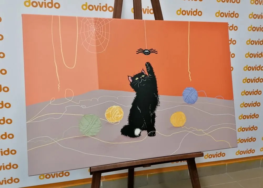 Obraz hravá mačka s klbkami