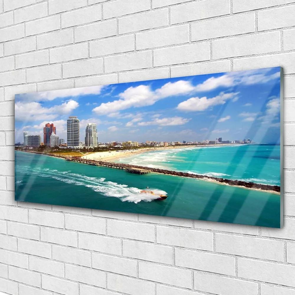 Obraz na akrylátovom skle More pláž mesto krajina 125x50 cm
