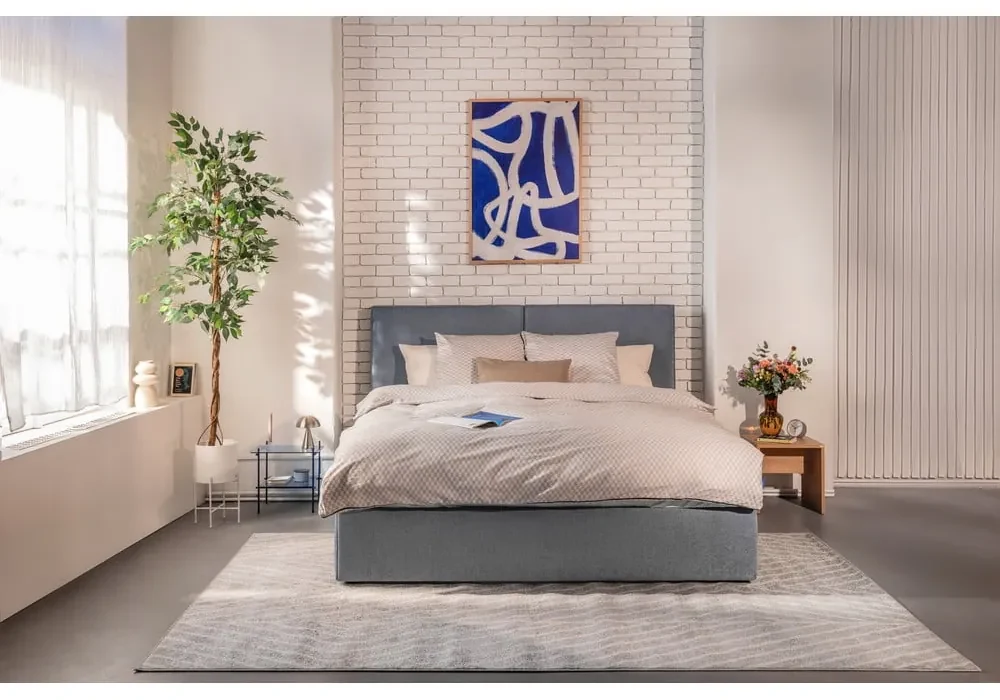 Modrá čalúnená dvojlôžková posteľ s úložným priestorom s roštom 180x200 cm Thessa Bold – Bonami Selection