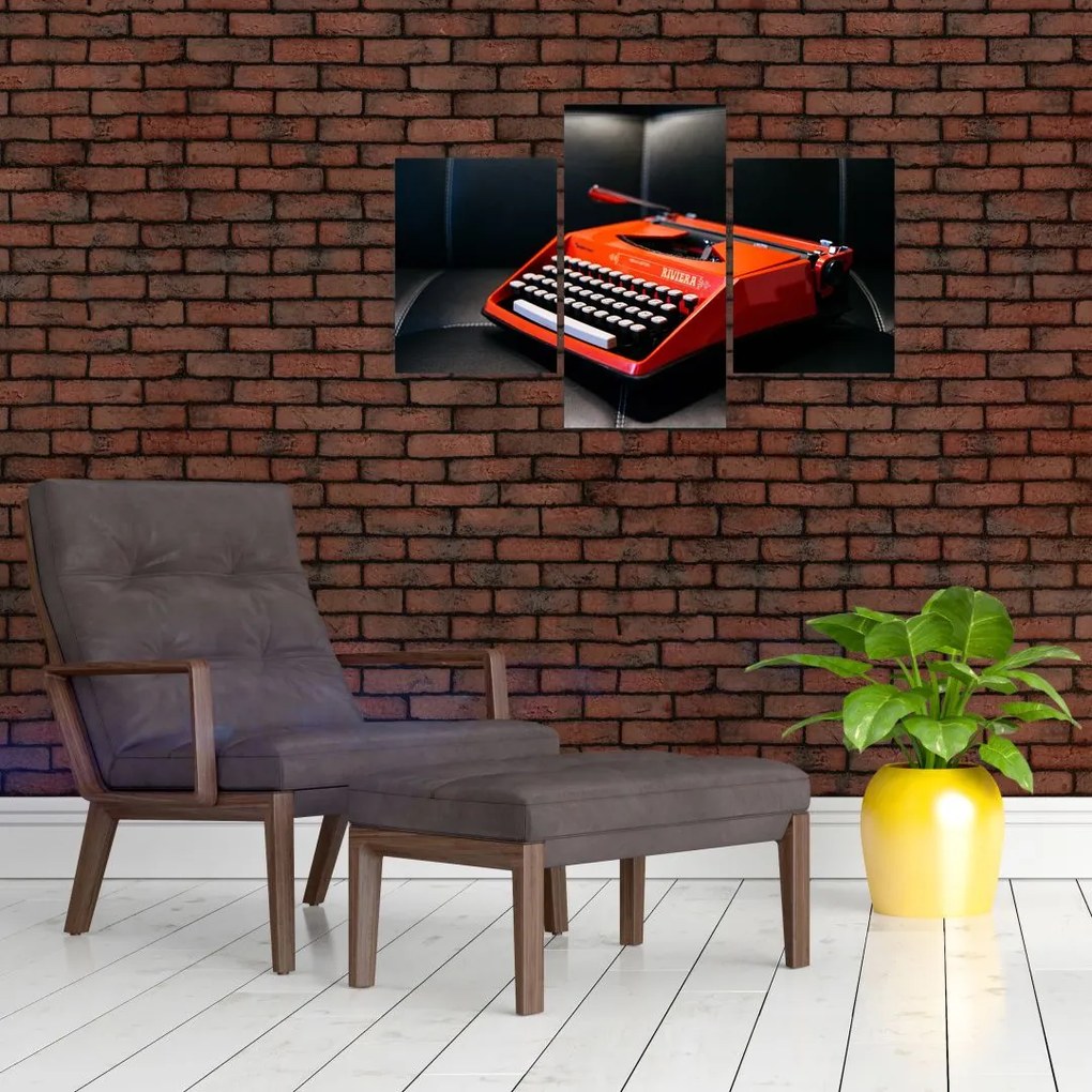 Obraz červeného písacieho stroja