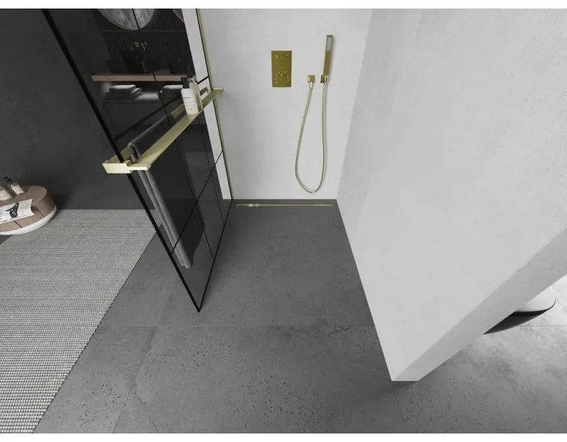 Mexen Kioto+, sprchová zástena Walk-In s poličkou a vešiakom 120 x 200 cm, 8mm číre sklo čierny vzor, zlatý matný profil, 800-120-121-55-77