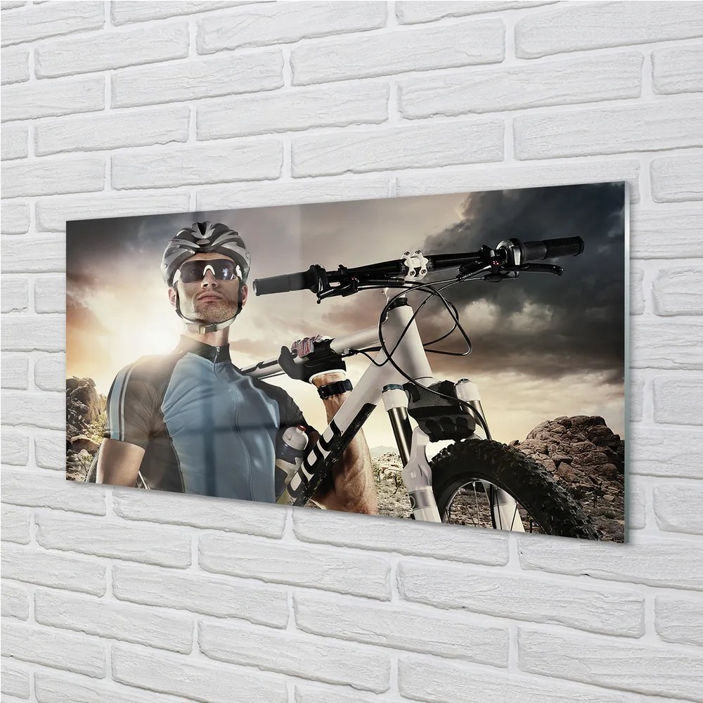 Obraz plexi Cyklista na bicykli mraky 140x70 cm