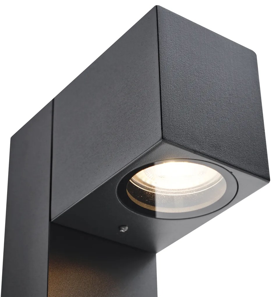 Moderná vonkajšia stojaca lampa čierna 65 cm so zásuvkou IP44 - Baleno