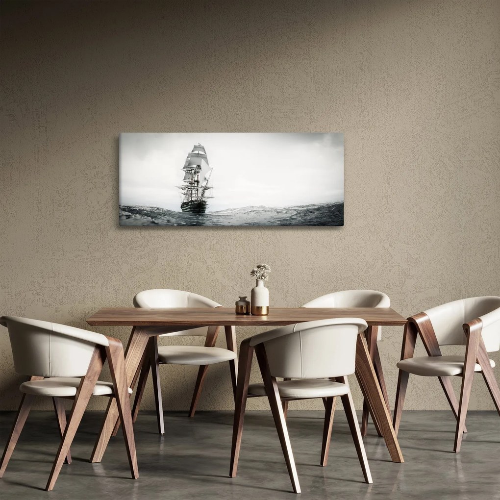 Obraz - Loď plávajúca po oceáne (120x50 cm)