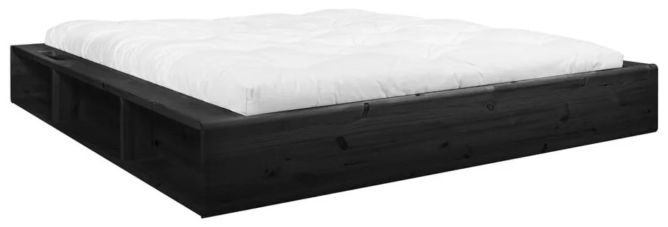 Čierna dvojlôžková posteľ z masívneho dreva s úložným priestorom a futonom Comfort Karup Design Ziggy, 140 x 200 cm