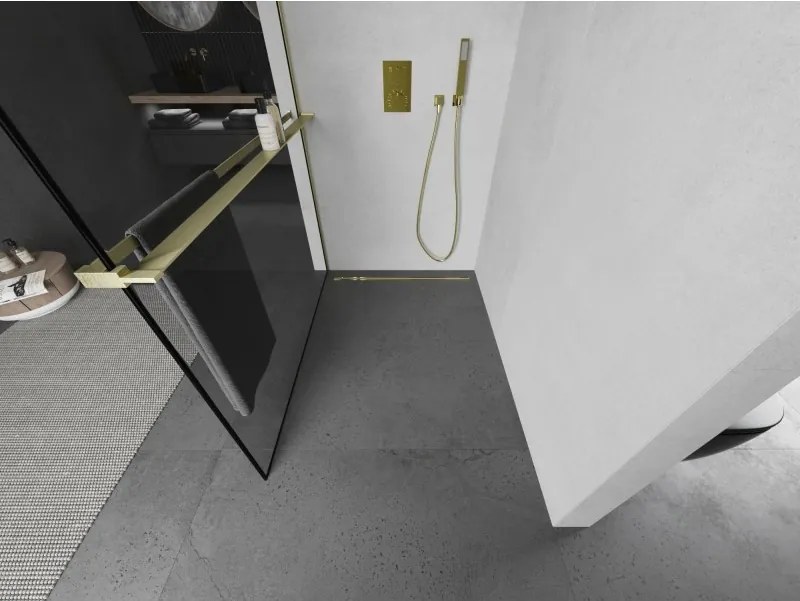 Mexen Kioto+, sprchová zástena Walk-In s poličkou a vešiakom 70 x 200 cm, 8mm číre sklo čierny vzor, zlatý matný profil, 800-070-121-55-70