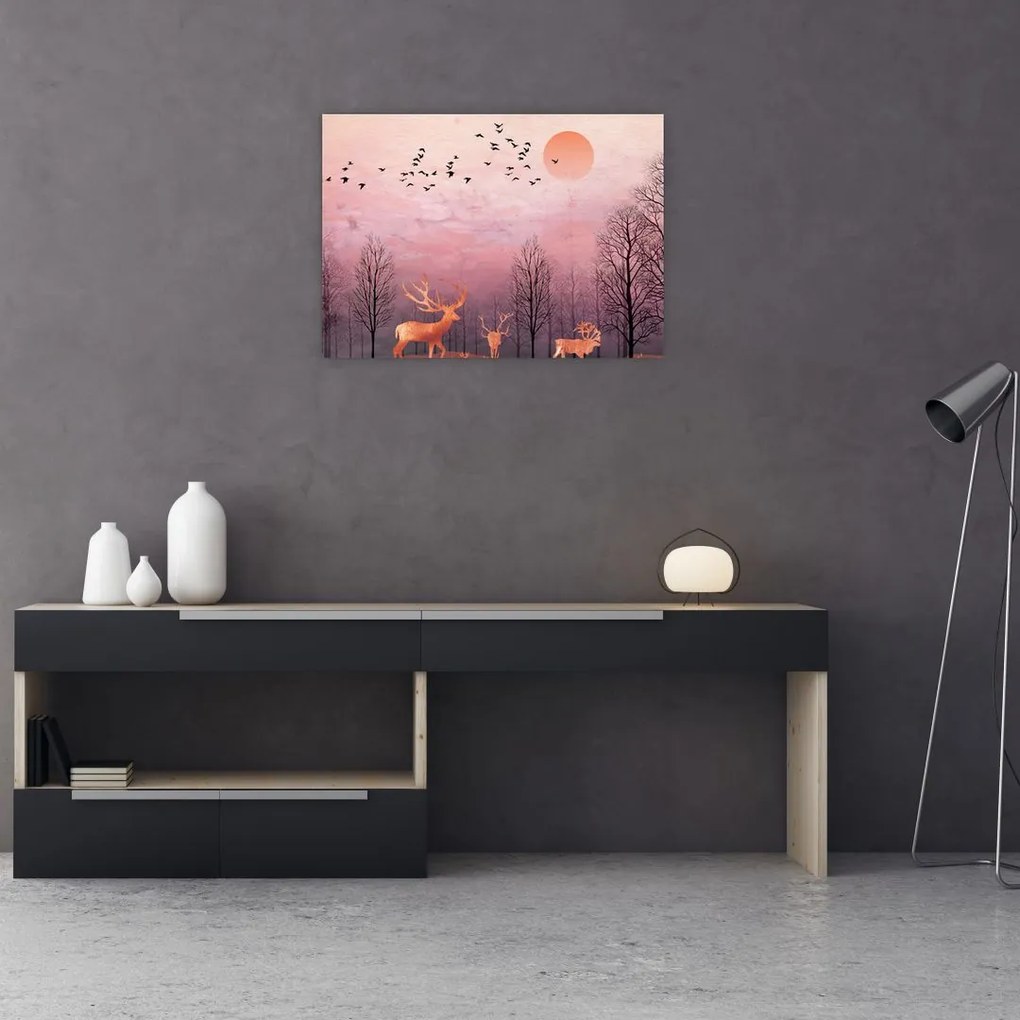 Sklenený obraz - Jelene v žiare zapadajúceho slnka (70x50 cm)