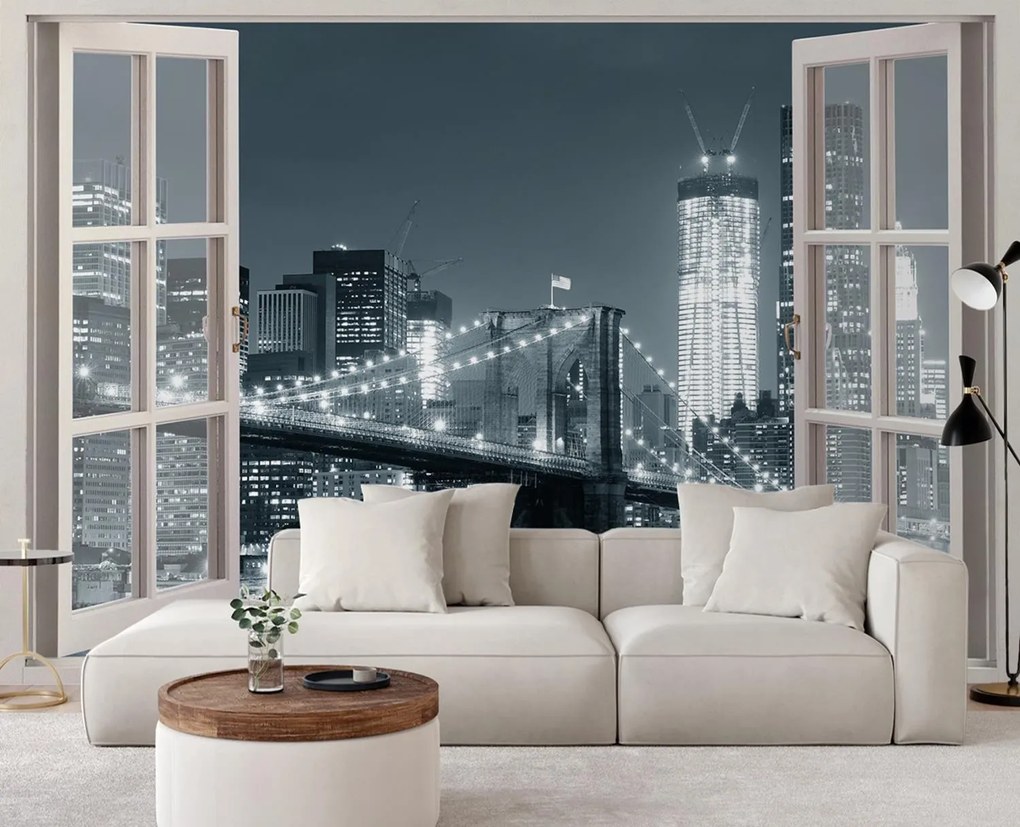 Gario Fototapeta Okno - New York City Brooklyn Bridge v čiernej a bielej farbe Materiál: Vliesová, Rozmery: 140 x 100 cm