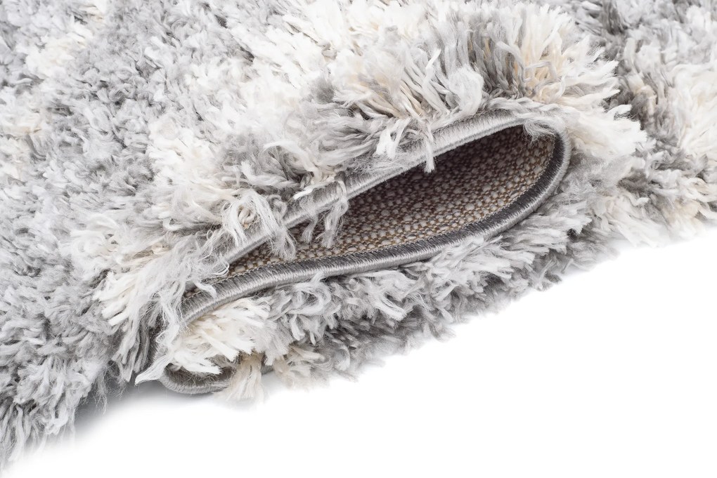 TA Koberec DC55B TMAVOSIVÁ AZTÉCKA EJF Rozmer: 70x300 cm