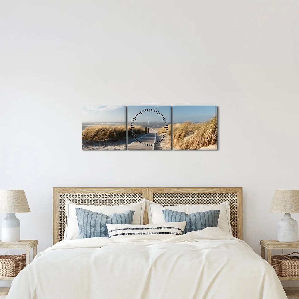 Obraz - Piesočná pláž na ostrove Langeoog, Nemecko (s hodinami) (90x30 cm)