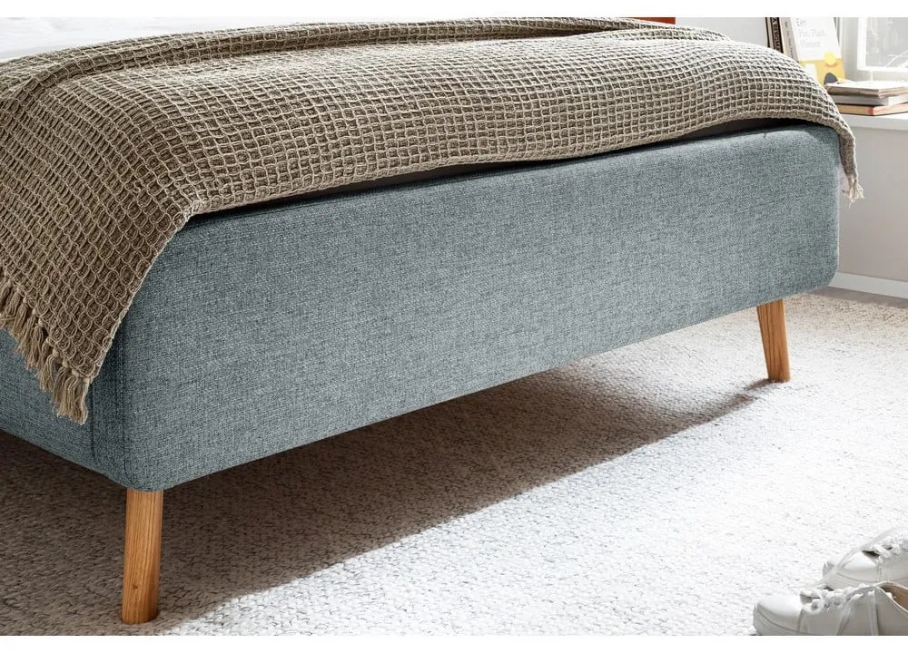 Sivomodrá čalúnená dvojlôžková posteľ s úložným priestorom s roštom 140x200 cm Lotte – Meise Möbel