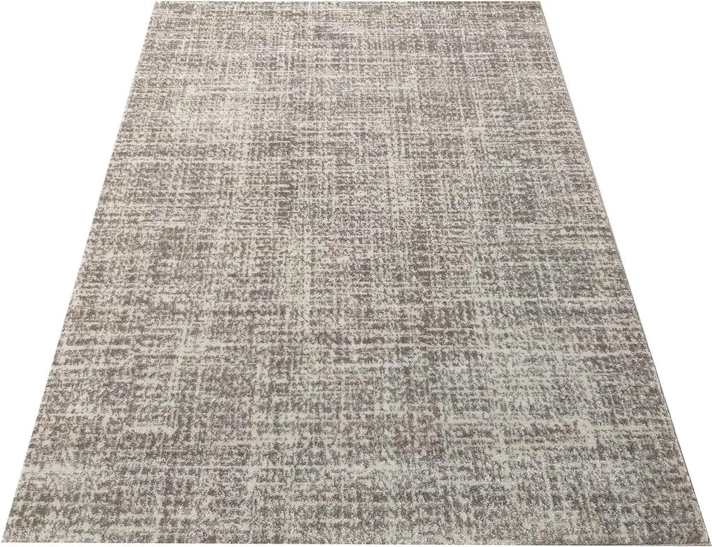 Moderný jednofarebný béžový koberec do obývačky