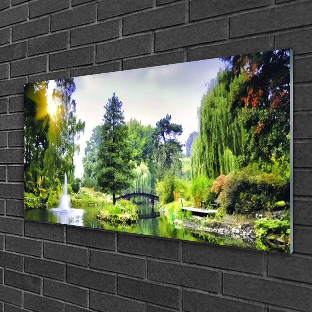 Obraz na skle Les vodopád slnko príroda 125x50 cm