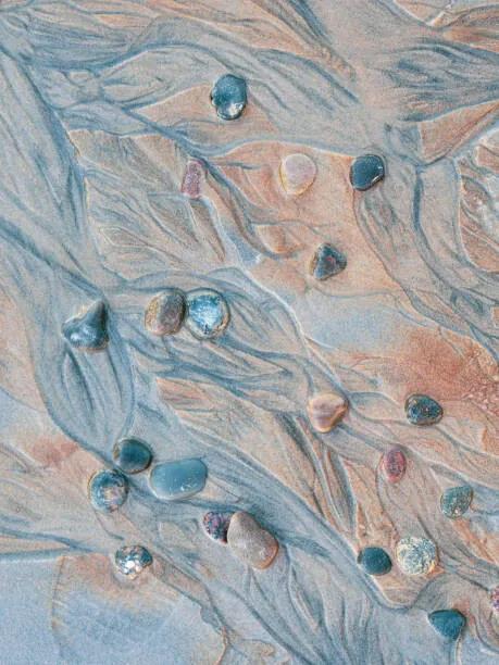 Umelecká fotografie Close-up of pebbles and textured sand, Johner Images, (30 x 40 cm)