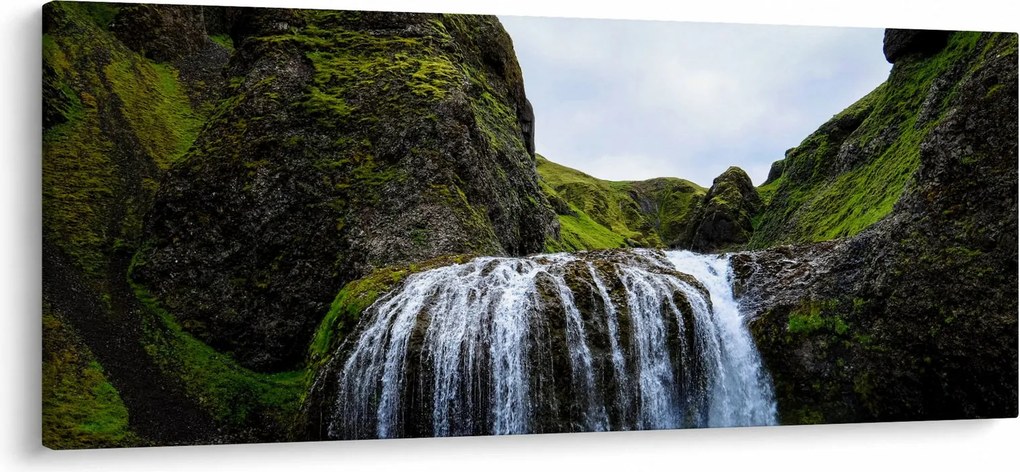 Obraz útesu s vodopádom (120x50 cm)