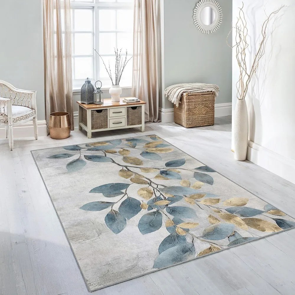Prateľný koberec vo svetlomodrej a zlatej farbe 160x230 cm Golden Leaves – Mila Home