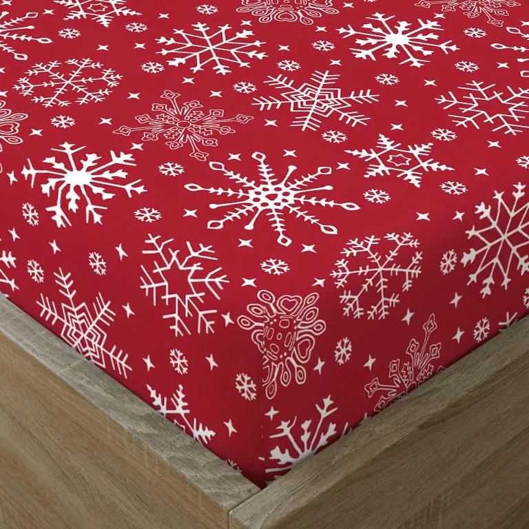 Goldea vianočná bavlnená napínacie plachta - vzor snehové vločky na červenom 90 x 200 cm