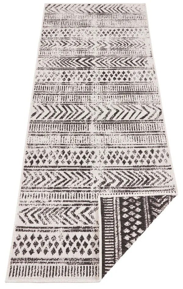 Čierno-krémový vonkajší koberec NORTHRUGS Biri, 80 x 250 cm