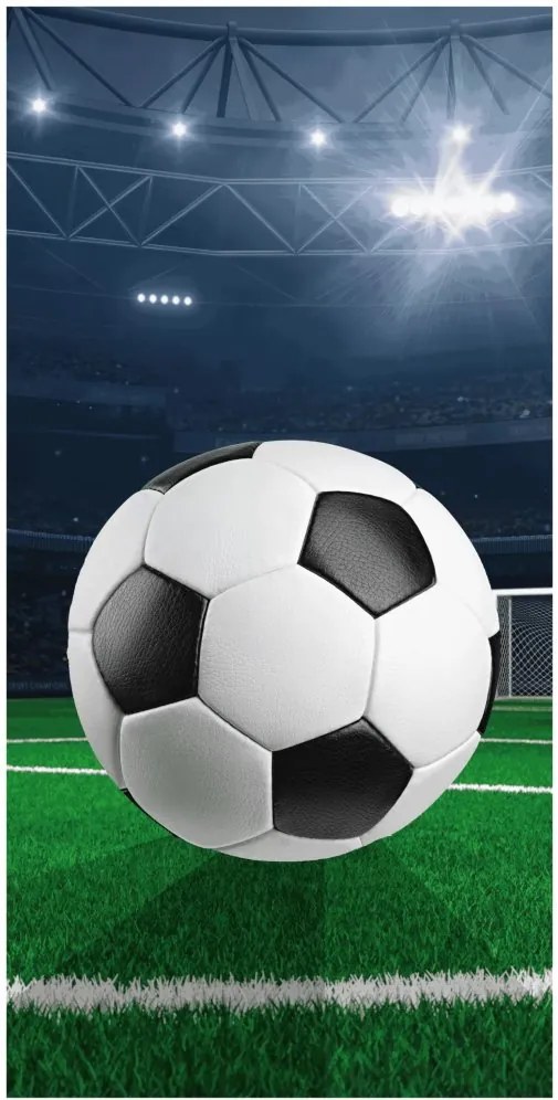 Bavlnená osuška s futbalovou loptou na štadióne