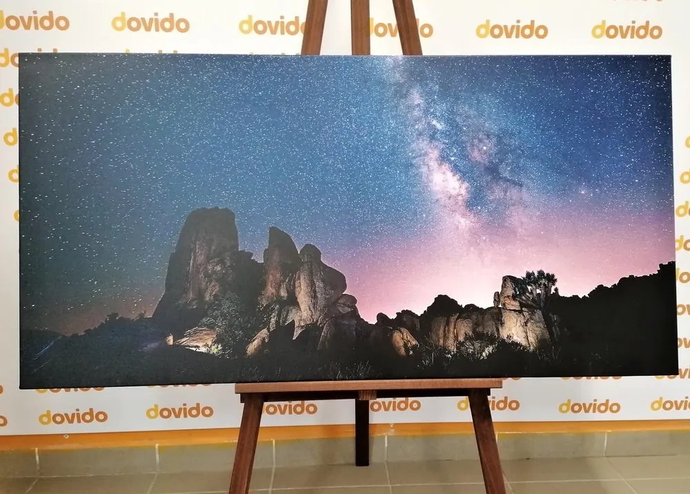 Obraz hviezdna obloha nad skalami - 100x50