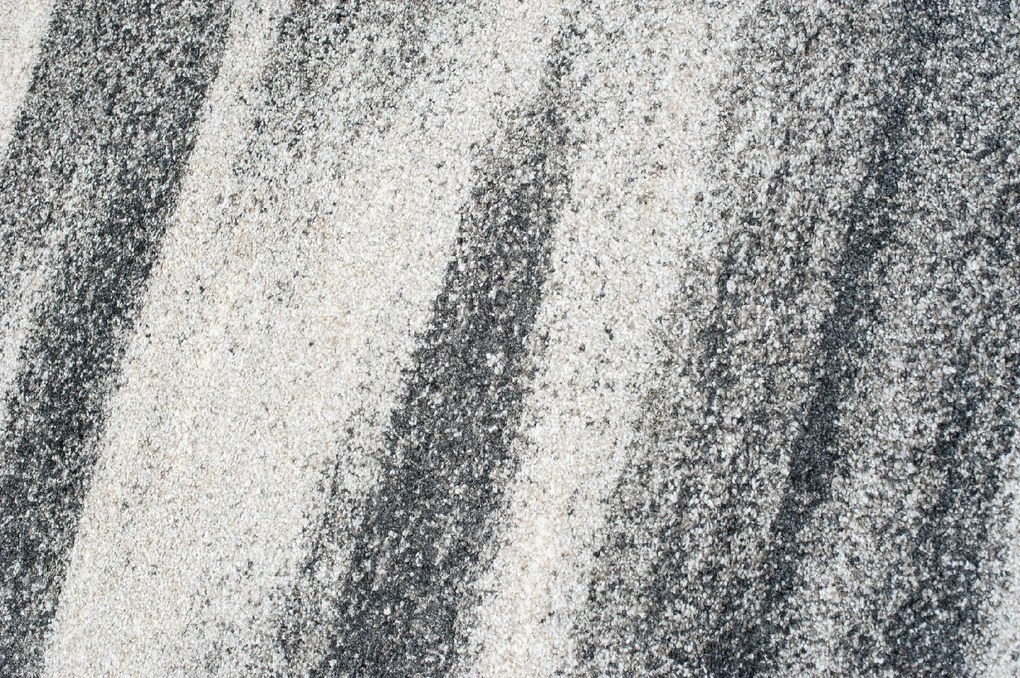 TA Koberec K206A TMAVOSIVÉ SARI B1X Rozmer: 70x300 cm