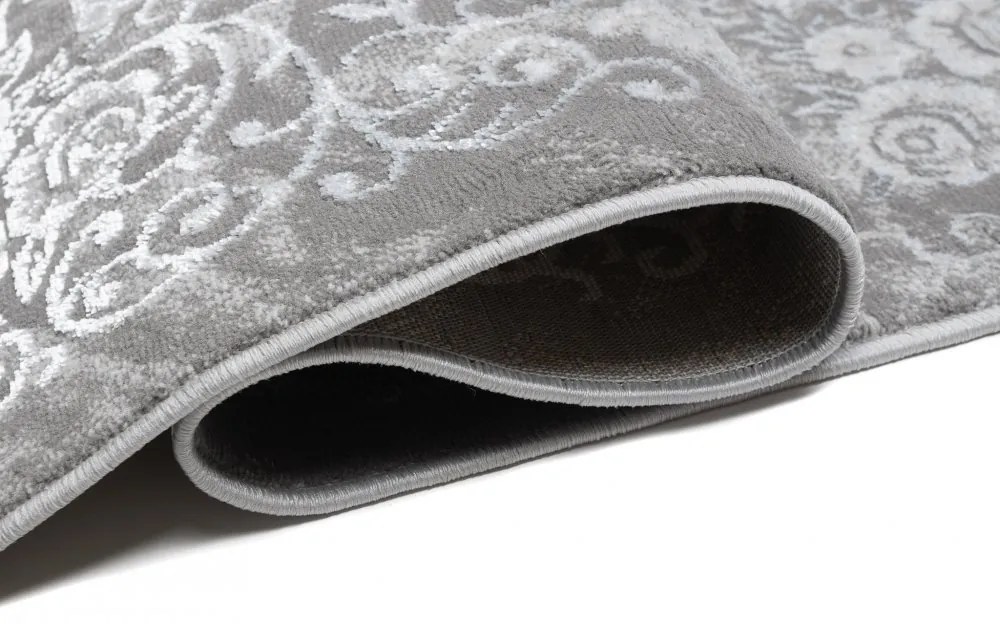 Moderný bielo-sivý dizajnový interiérový koberec so vzorom Šírka: 80 cm | Dĺžka: 150 cm