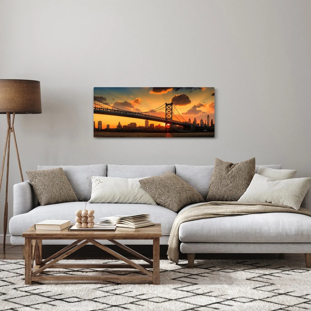 Obraz - Západ slnka nad mostom Bena Franklina, Filadelfia (120x50 cm)