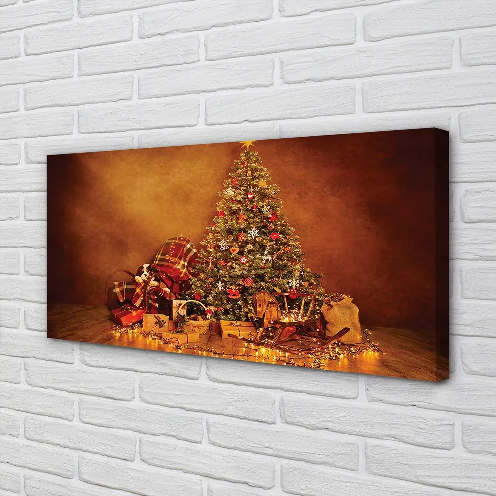 Obraz na plátne Vianočné osvetlenie dekorácie darčeky 140x70 cm