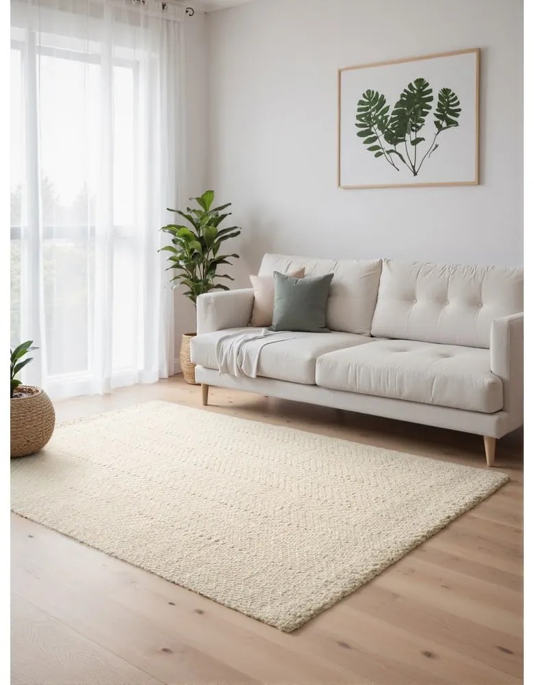 Krémový/slonovinový ručne tkaný koberec s prímesou vlny 80x150 cm Majoli – Elle Decoration