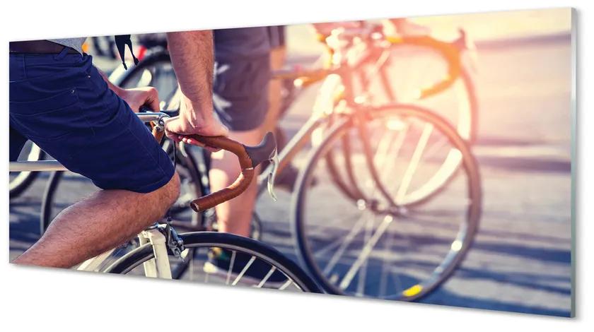 Obraz plexi Cyklisti ľudí 120x60 cm