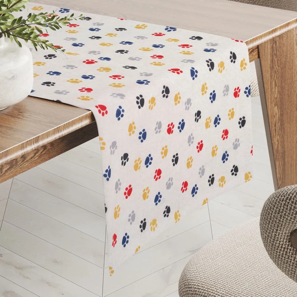 Biante Detský dekoračný behúň na stôl Leona LN-012 Farebné labky na krémovom 35x140 cm