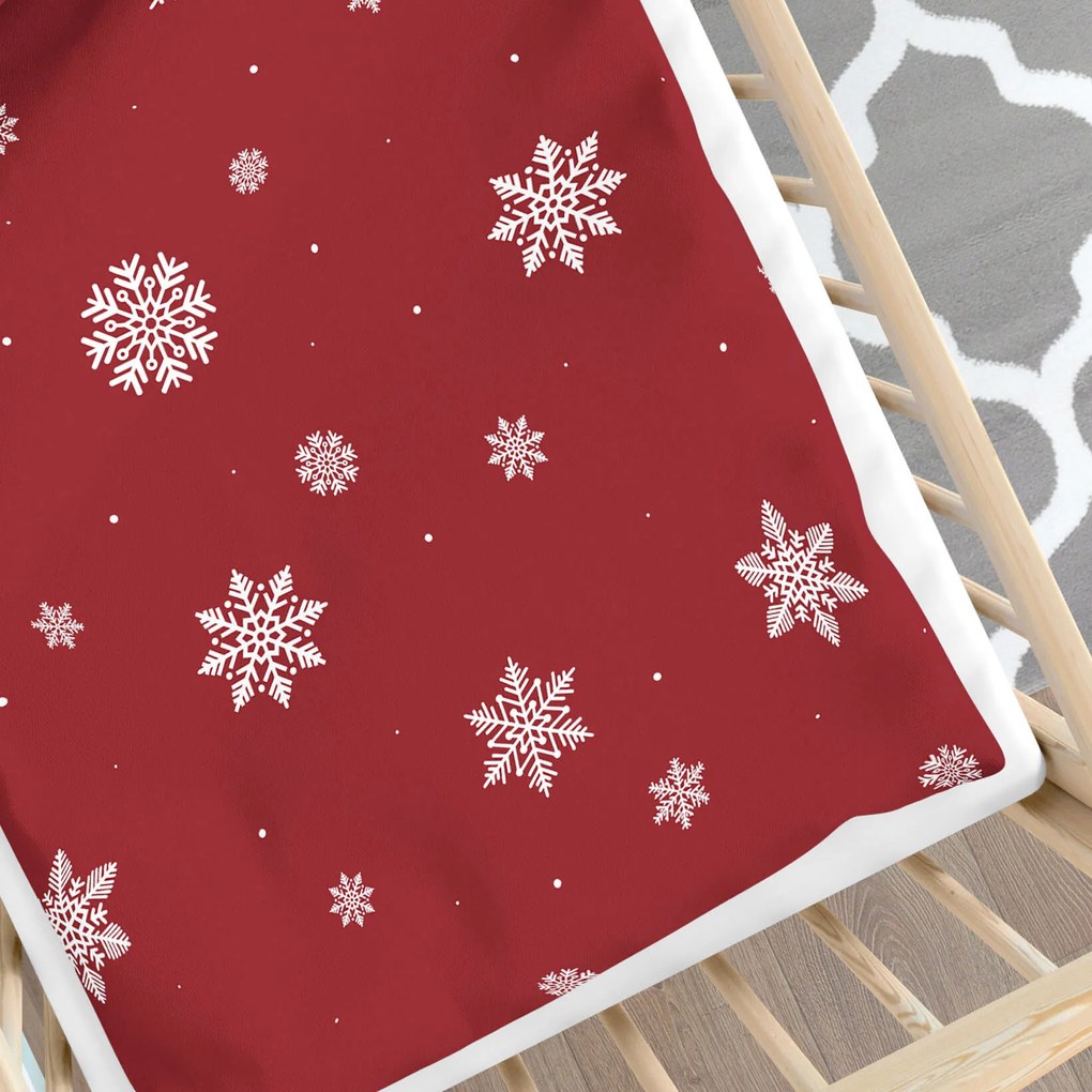 Goldea detské bavlnené obliečky do postieľky - snehové vločky na červenej 110 x 125 a 35 x 55 cm