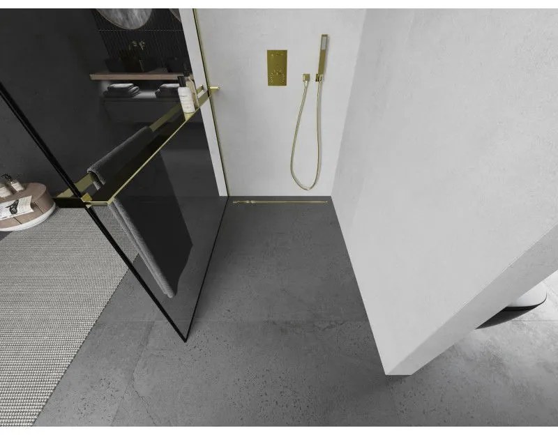 Mexen Kioto+ L, sprchová zástena Walk-In s poličkou a vešiakom 70 x 200 cm, 8mm číre sklo čierny vzor, zlatý lesklý profil,800-070-123-50-70