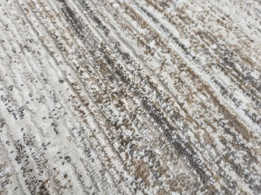 DC Koberec Oman 412 tmavá vizion zlatá Rozmer: 140×190 cm