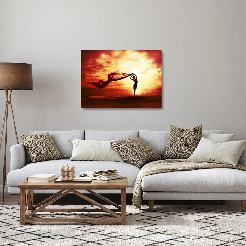 Sklenený obraz - Silueta ženy v západu slnka (70x50 cm)