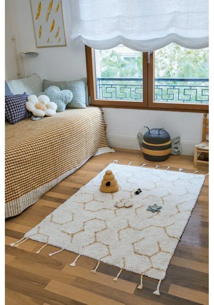 Krémový bavlnený detský hrací koberec 90x130 cm Pollination – Lorena Canals