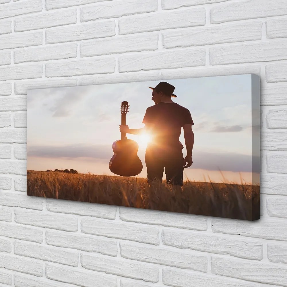 Obraz canvas gitara muž 140x70 cm