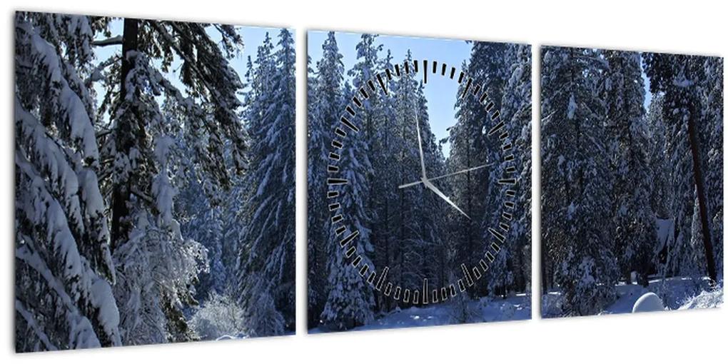 Obraz zasneženého lesa (s hodinami) (90x30 cm)