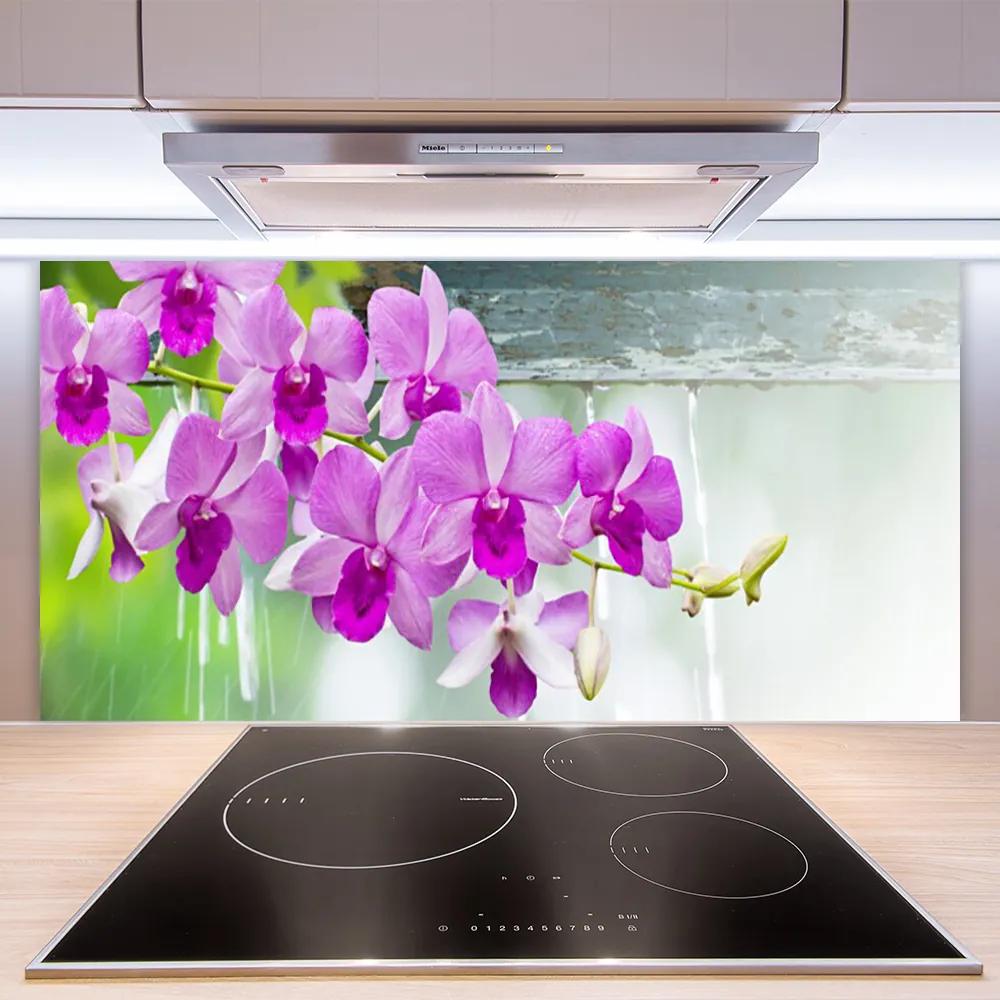 Sklenený obklad Do kuchyne Orchidey kvapky príroda 125x50 cm