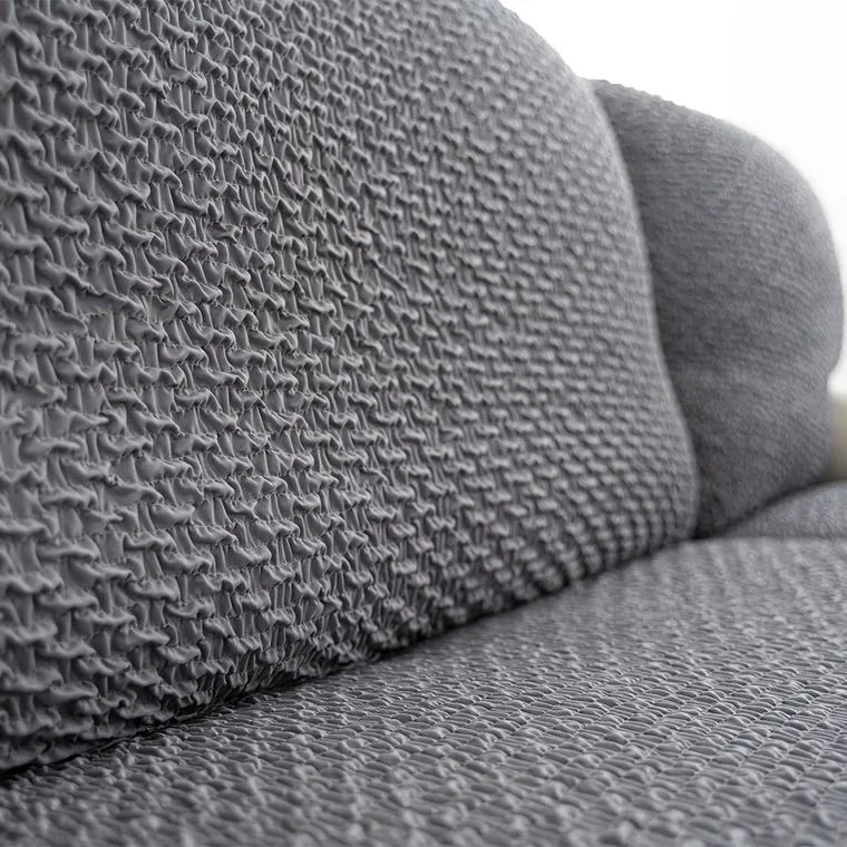 Bielastické poťahy MODULO tmavosivé úzky otoman (65-95 cm x 135-190 cm)