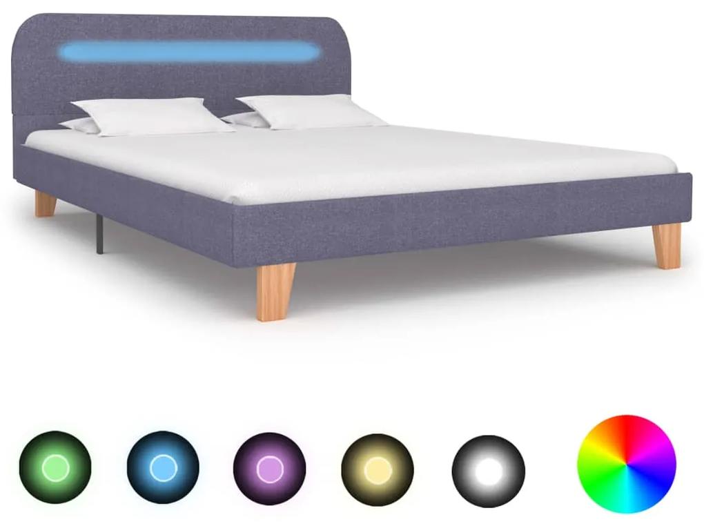 Rám postele s LED svetlom bledosivý látkový 140x200 cm 280898