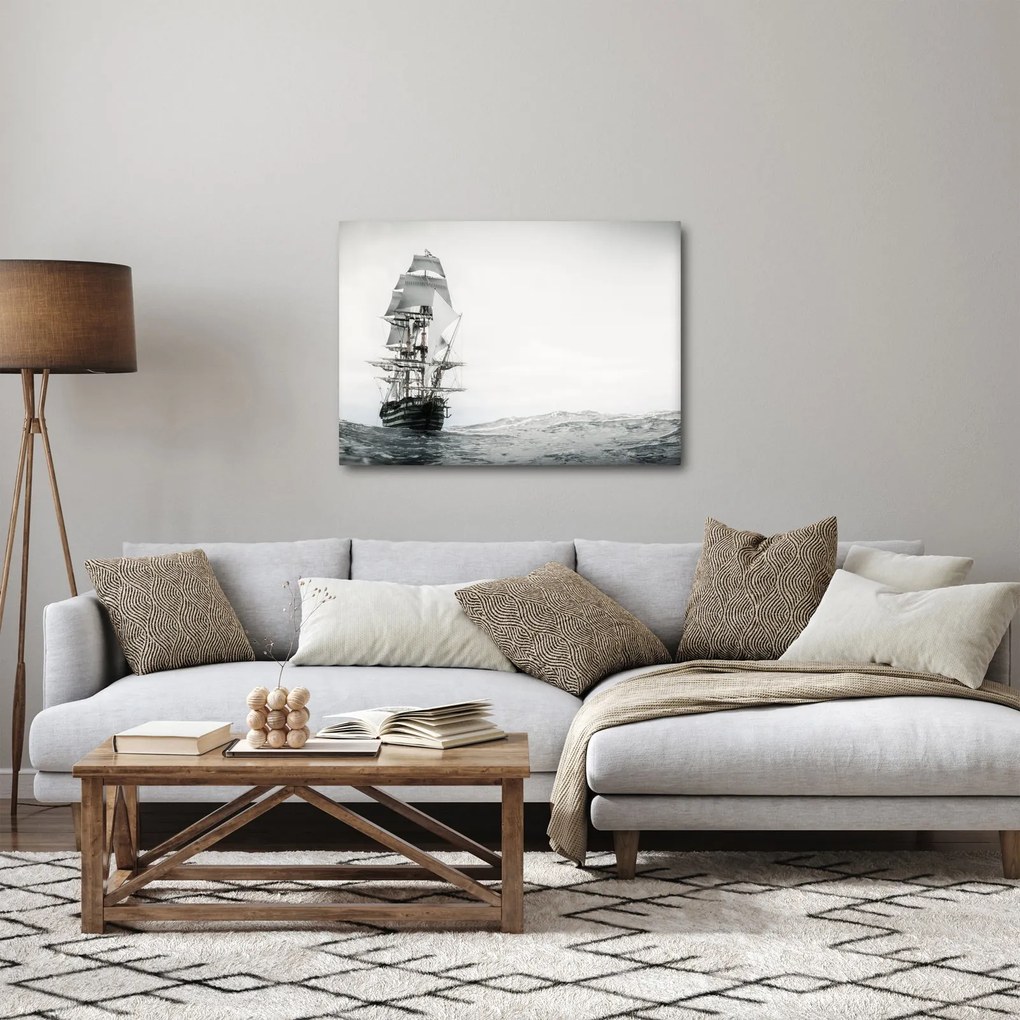 Obraz - Loď plávajúca po oceáne (70x50 cm)