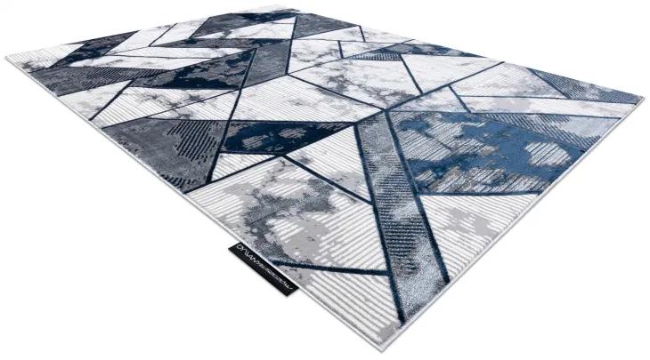 Moderný koberec DE LUXE 632 Geometrický - Štrukturálny krém  / tmavomodrý