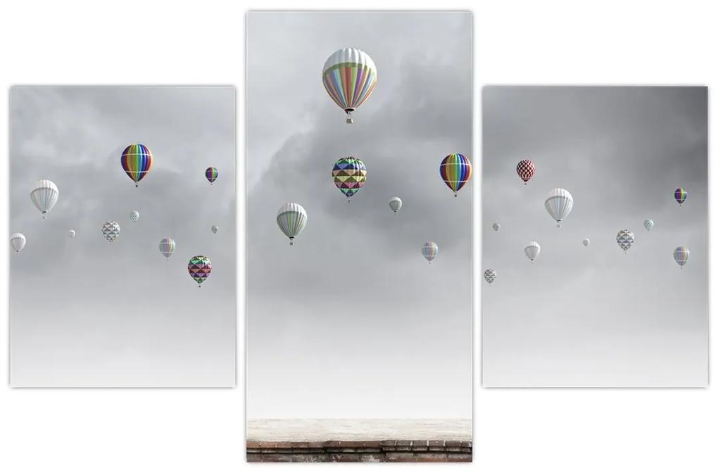 Obraz - Balóny nad tehlovou stenou (90x60 cm)
